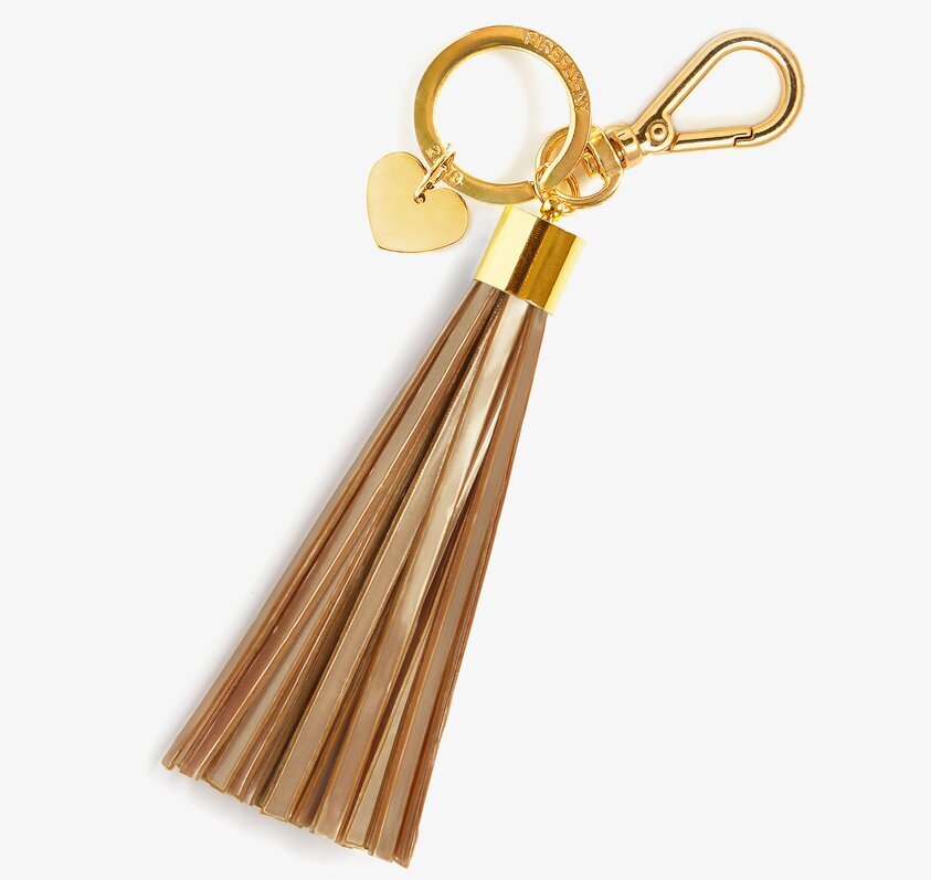 Reflextofs Golden Caramel Deluxe från Firefly på vit bakgrund