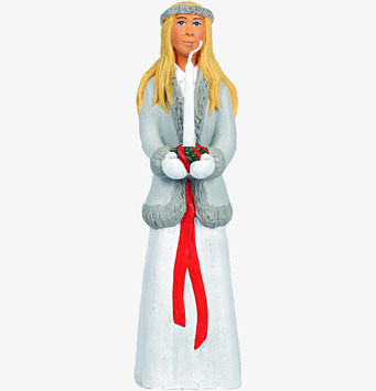 Tärna Lisa från Sverigealmanackan i traditionell luciaklädsel