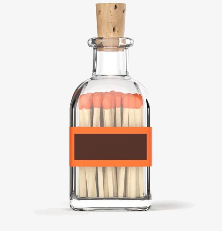 Tändstickor Liten Eld från Eldstickan i glasflaska med kork