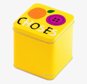 Bild av färgglad plåtburk med lekfull design och färg