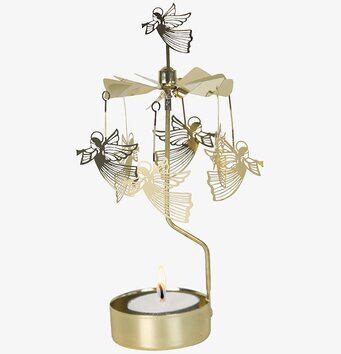 Bild av ett förtrollande änglaspel med ljushållare