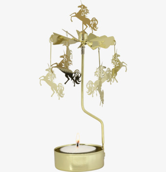 Bild av elegant änglaspel med snurrande enhörningar