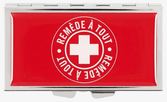 Medicinetui från Derriére la porte med rött lock och vit text