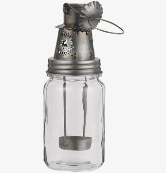 Bild av elegant hängande ljuslykta i metall och glas