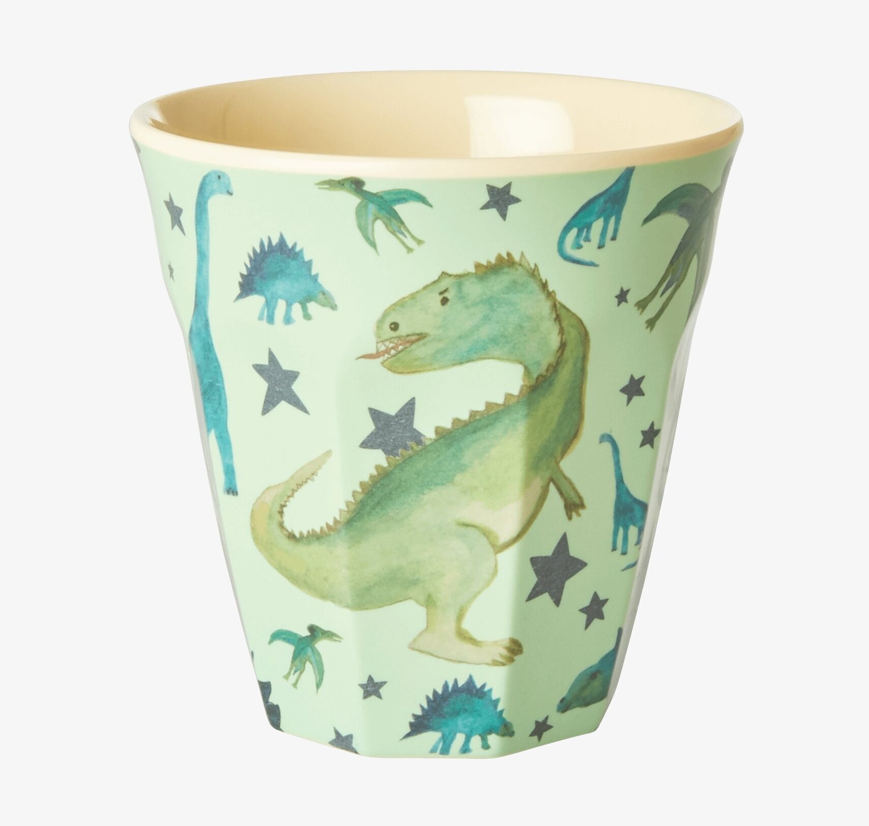 Bild av livfull mugg med dinosaurieprint och stjärnor