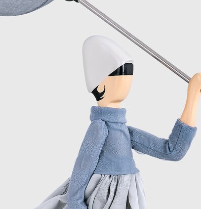 Bordslampa Perla från Skitso, stiliserad figur med paraply