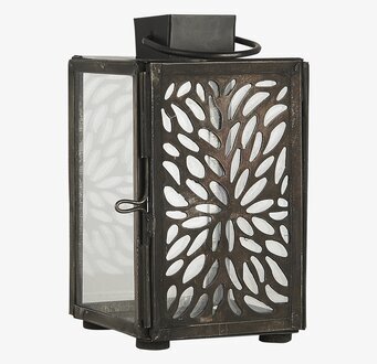 Bild av dekorativ ljuslykta med genombrutet mönster