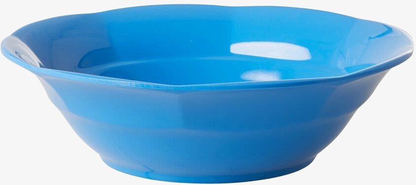 Djup Skål Ocean Blue från Rice på en enkel, neutral bakgrund