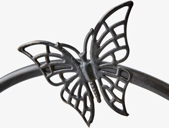 Bild av värmeljushållare med fjärilsmotiv i metall