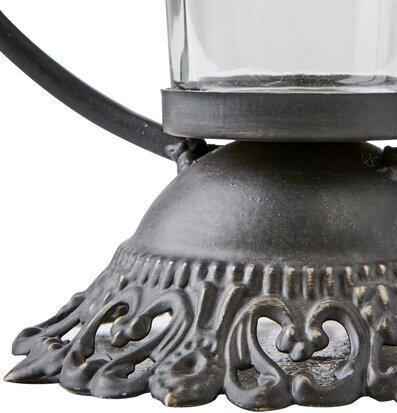 Bild av detaljrik värmeljushållare med mönster