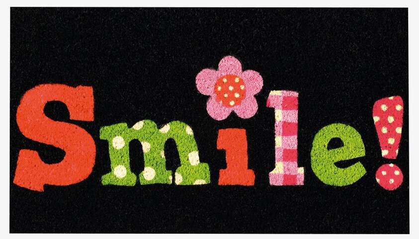 Dörrmatta Smile från Derriére la porte med färgglad text