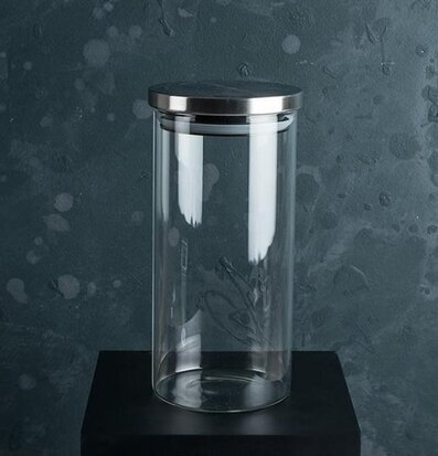 Bild av glasburk med stilren design och metalliskt lock