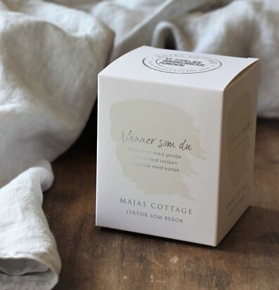 Bild av presentbox på rustikt bord med mjuk belysning