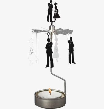 Bild av dekorativt änglaspel med brudpar i siluett