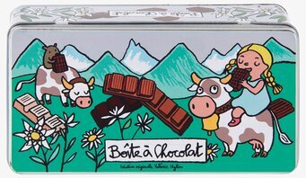 Bild av färgglad plåtburk med glada kor och flicka