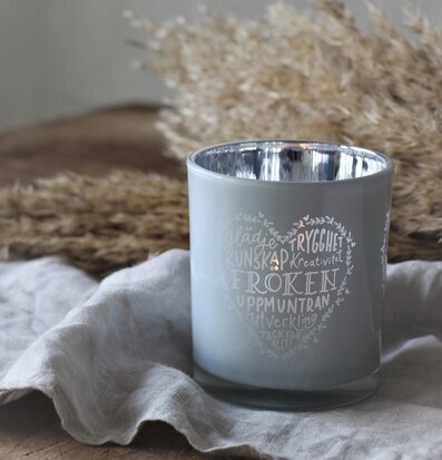 Bild av elegant ljuslykta med inspirerande ord