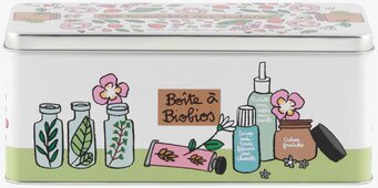 Bild av en dekorativ plåtburk med naturläkemedelstema