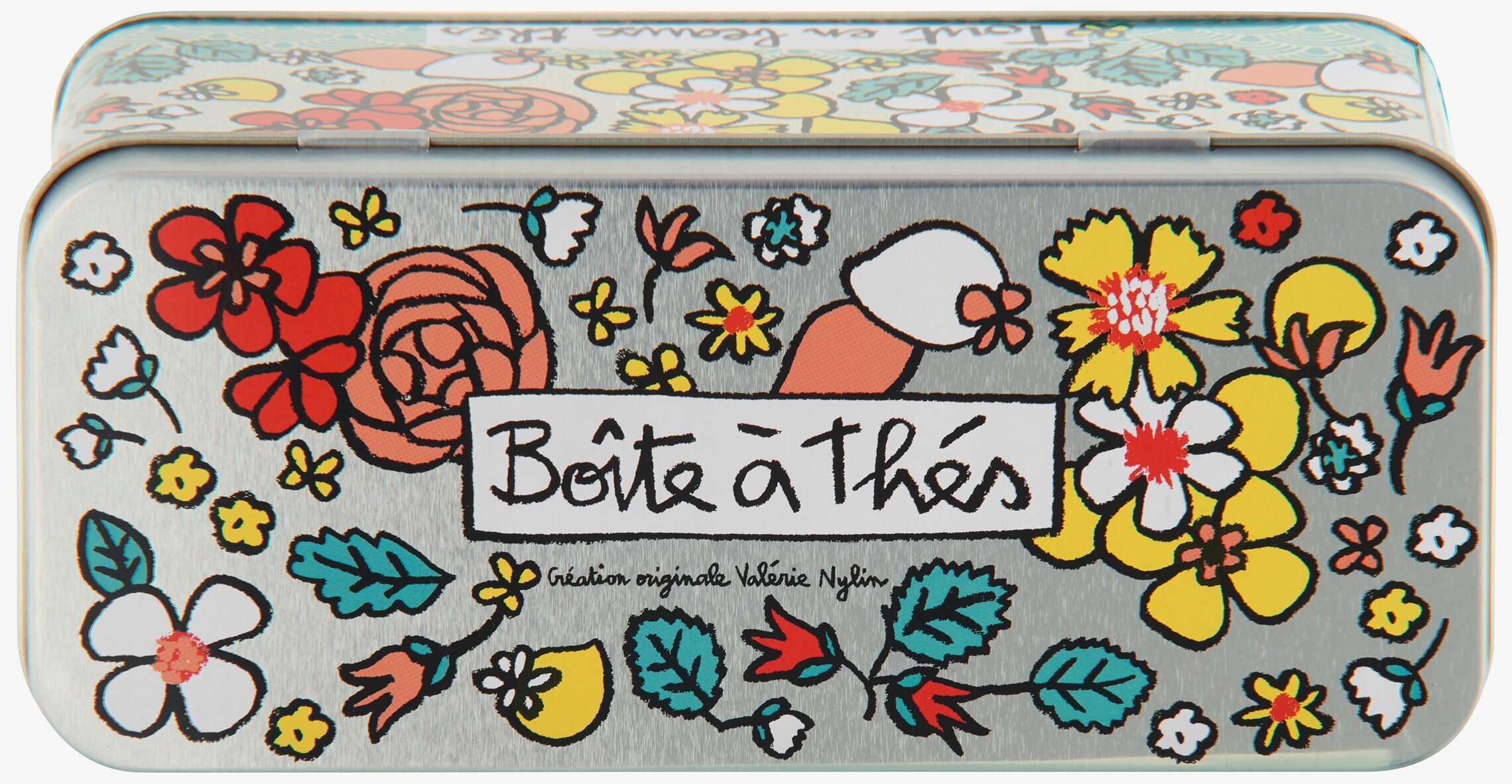 Bild av färgglad plåtburk för tepåsar med blommor