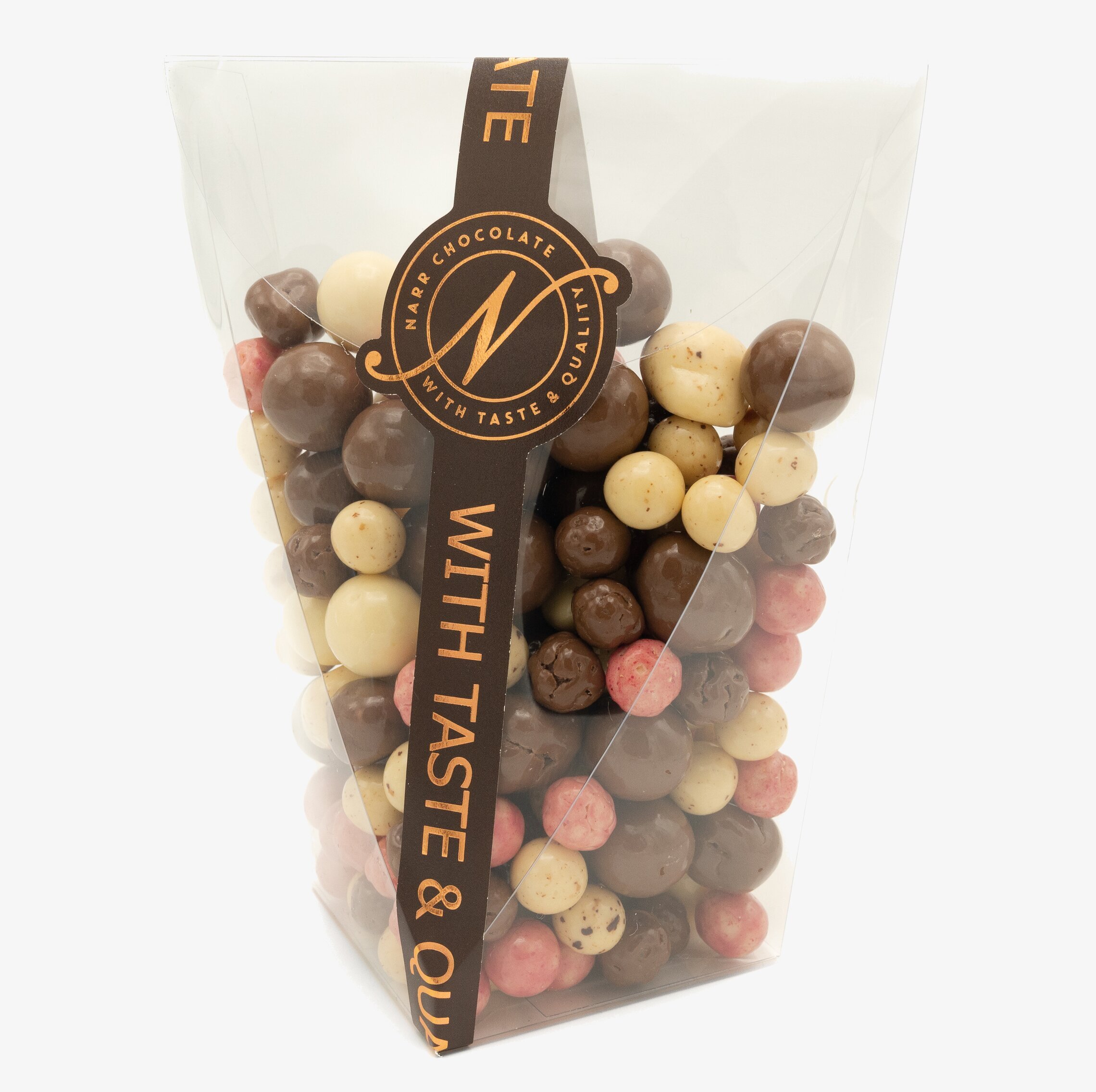 Foto av lyxig chokladförpackning med färgglada kulor