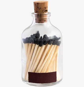 Eldstickan Tändstickor Rund Svart i glasbehållare med kork
