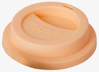 Bild av silikonlock i aprikosfärg med varningstext