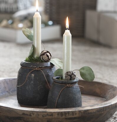 Stenkruka Unika från IB Laursen på träbricka med tända ljus