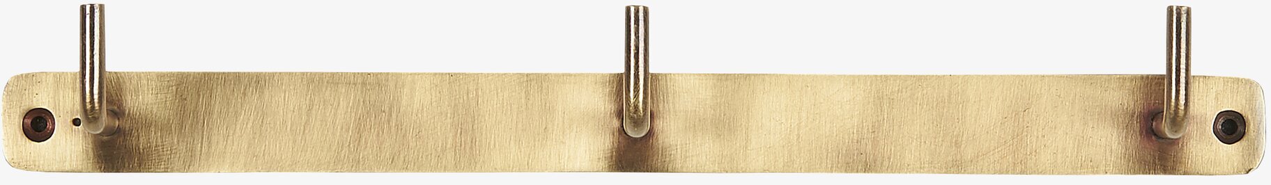 Väggkrokar Antik Mässing från IB Laursen på en vägg