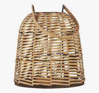 Foto av stor ljuslykta i rotting med glascylinder