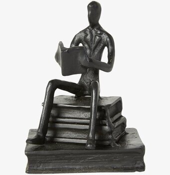 Figurin Läsande Man från Speedtsberg, stiliserad och svart