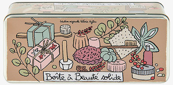 Bild av rektangulär plåtburk med skönhetsmotiv