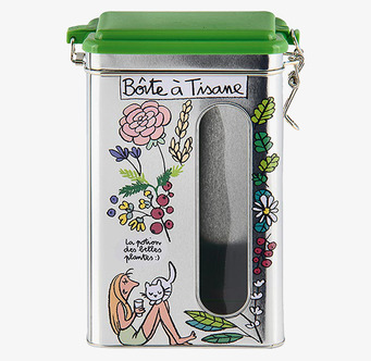 Bild av dekorativ plåtburk för teförvaring i köket