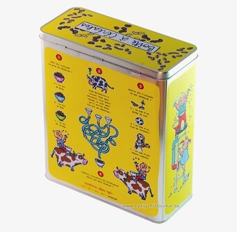 Bild av färgglad plåtburk för frukostflingor i köket