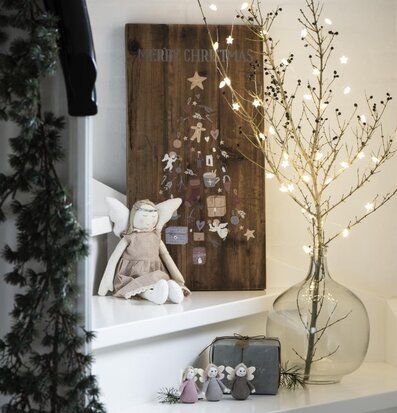 Ljusslinga 40 Stjärnor från IB Laursen över kvist i glasvas