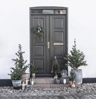 Klocka Med Jutesnöre Stor från IB Laursen på mörk träddörr