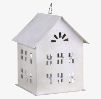 Bild av ljuslykta med vintage design och stjärnöppning