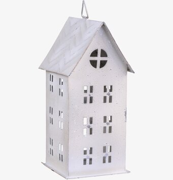 Bild av antik krämfärgad ljuslykta med rustik design