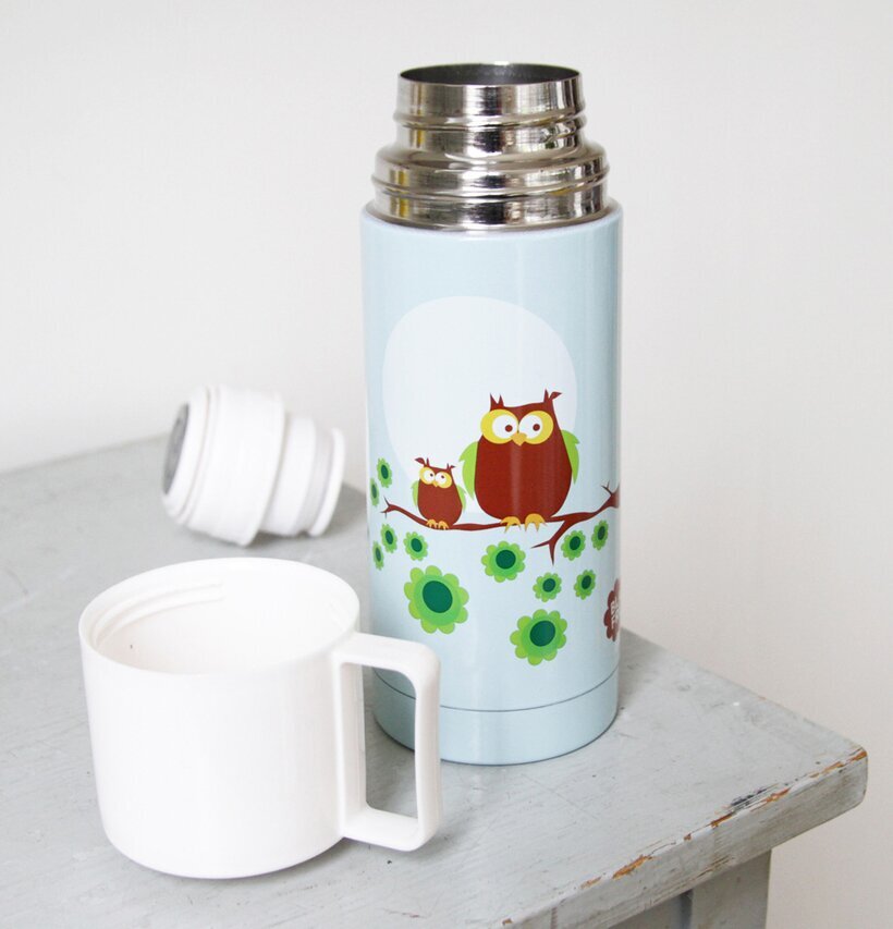Termos Uggla från Blafre på grått träbord med vit mugg