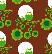 Presentpapper Brun uggla från Blafre med gröna ugglor och blommor