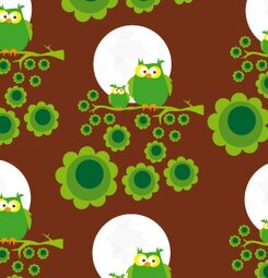 Presentpapper Brun uggla från Blafre med gröna ugglor och blommor