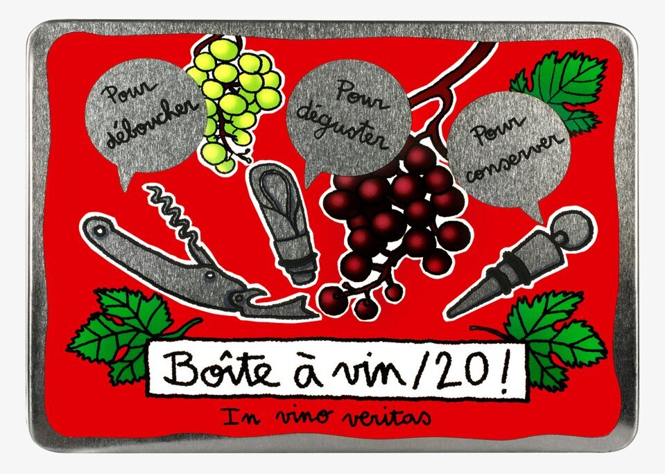 Bild av färgstark plåtburk med vinöppnare och tillbehör