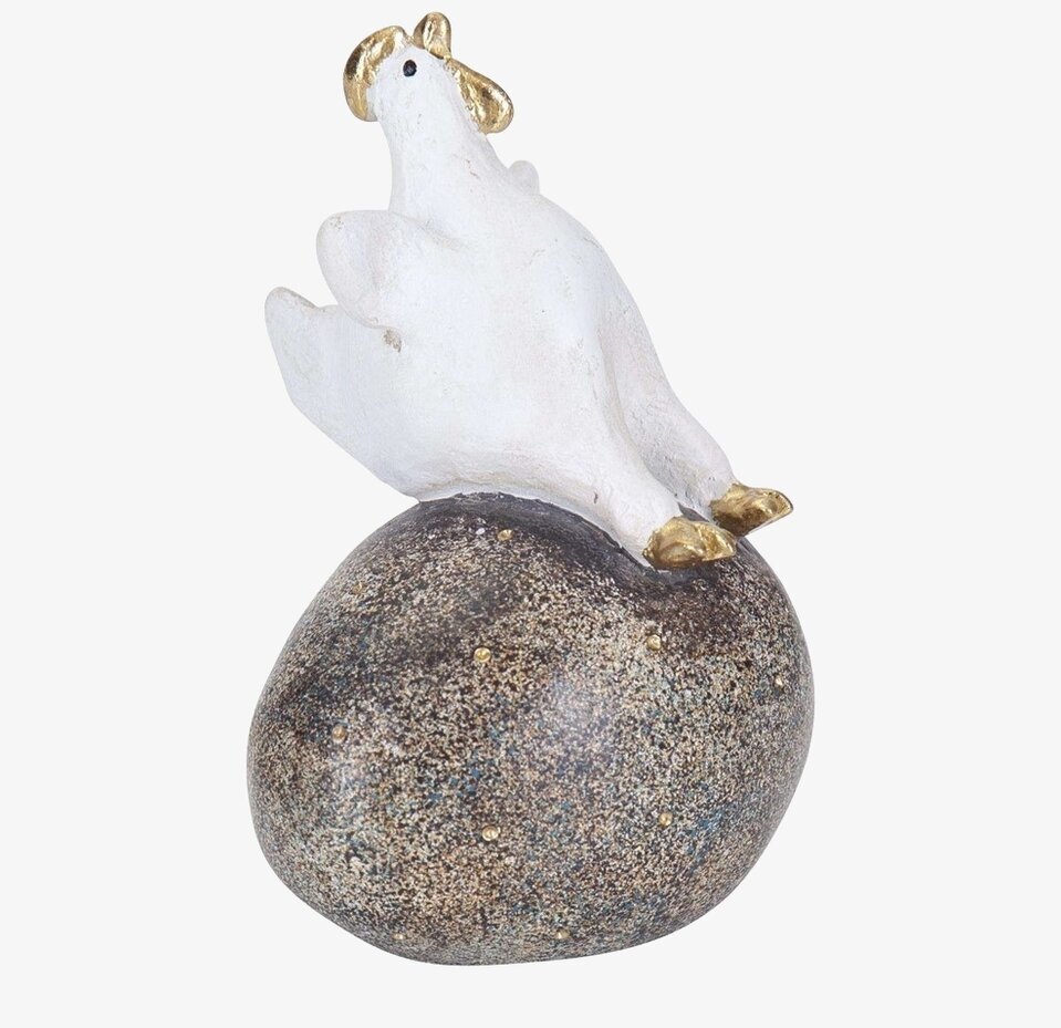 Hönan Ruth På Ägg från Nääsgränsgården på ett rustikt ägg