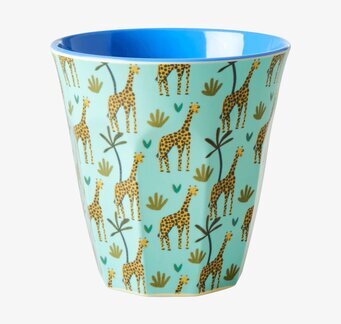 Bild av mugg med livfullt mönster och blå insida