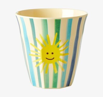 Bild av mugg med lekfullt blått och gult mönster