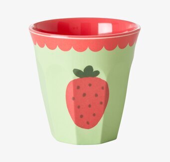 Bild av färgglad mugg med fruktmotiv och vågig kant