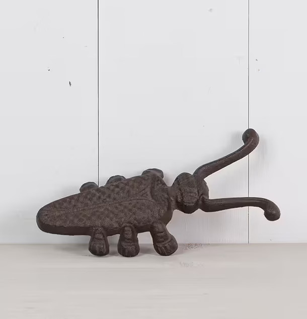 Stövelknekt Gjutjärn från Multi Agentur på ljus träbakgrund