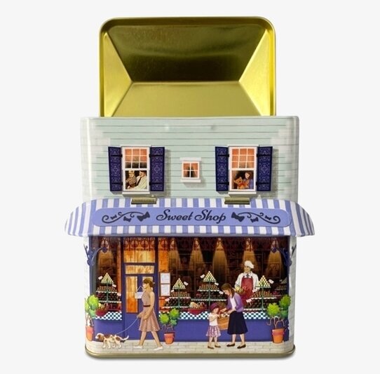 Bild av nostalgisk plåtburk formad som godisbutik