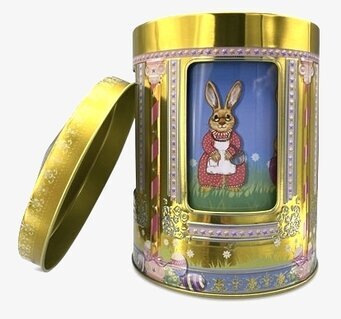 Bild av gyllene speldosa med kaninmotiv och blommor