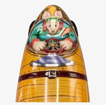 Bild av färgglad plåtburk med kaninförare i racerbil