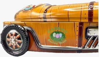 Bild av färgglad och unik plåtburk med racerbilstema