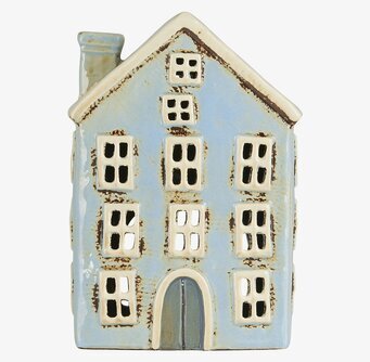 Bild av ljuslykta med husdesign i ljusblå keramik